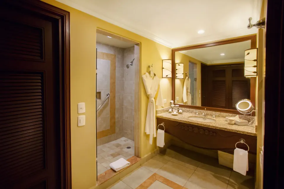 Executive Suite Ocean View bathroom vanity and shower at Pueblo Bonito Sunset Beach Golf & Spa Resort.