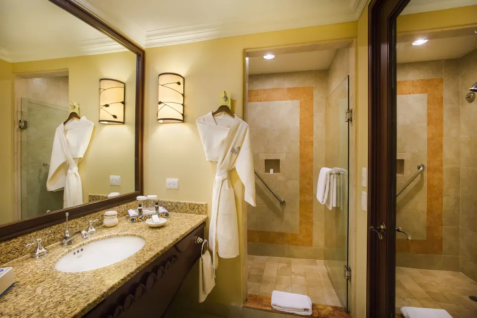 Executive Suite Ocean View bathroom with vanity and walk-in shower at Pueblo Bonito Sunset Beach Golf & Spa Resort.