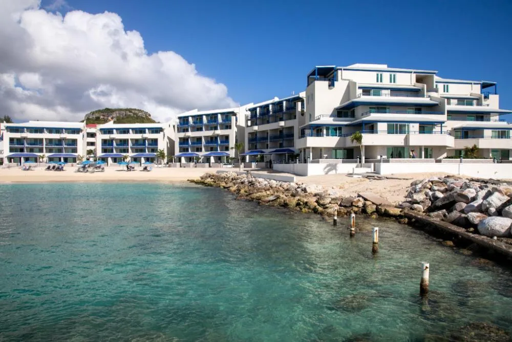 Hilton Vacation Club Flamingo Beach St. Maarten beachfront vacation resort with pool and sandy beach in Simpson Bay, Sint Maarten.
