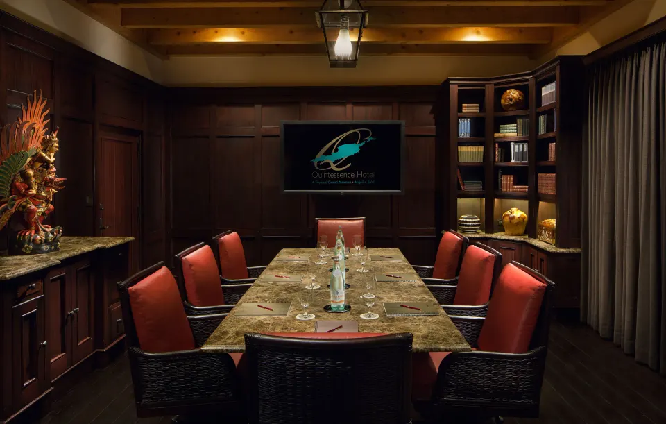 Private boardroom with long table and chairs at Quintessence Hotel