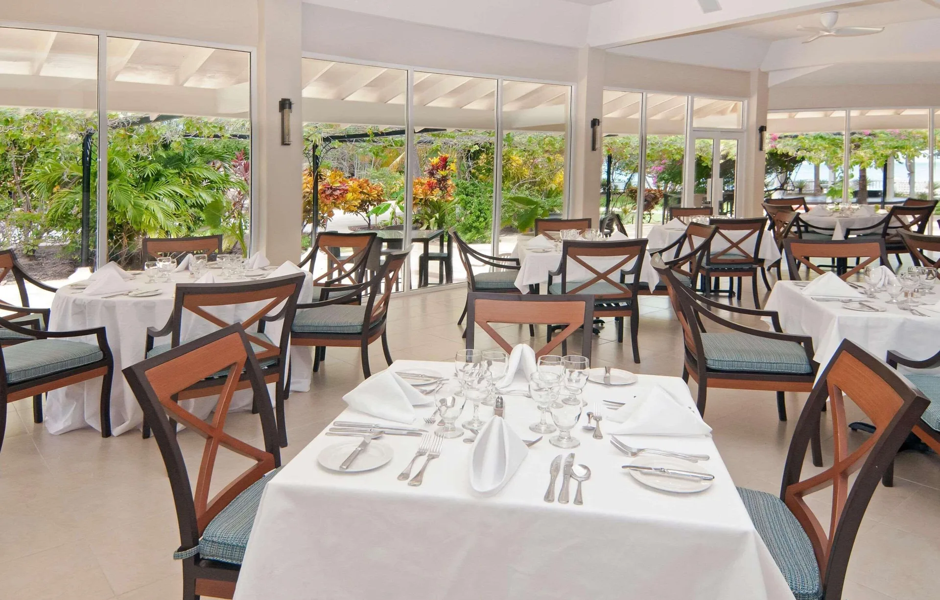 White-tablecloth dining room at Radisson Grenada Beach Resort.