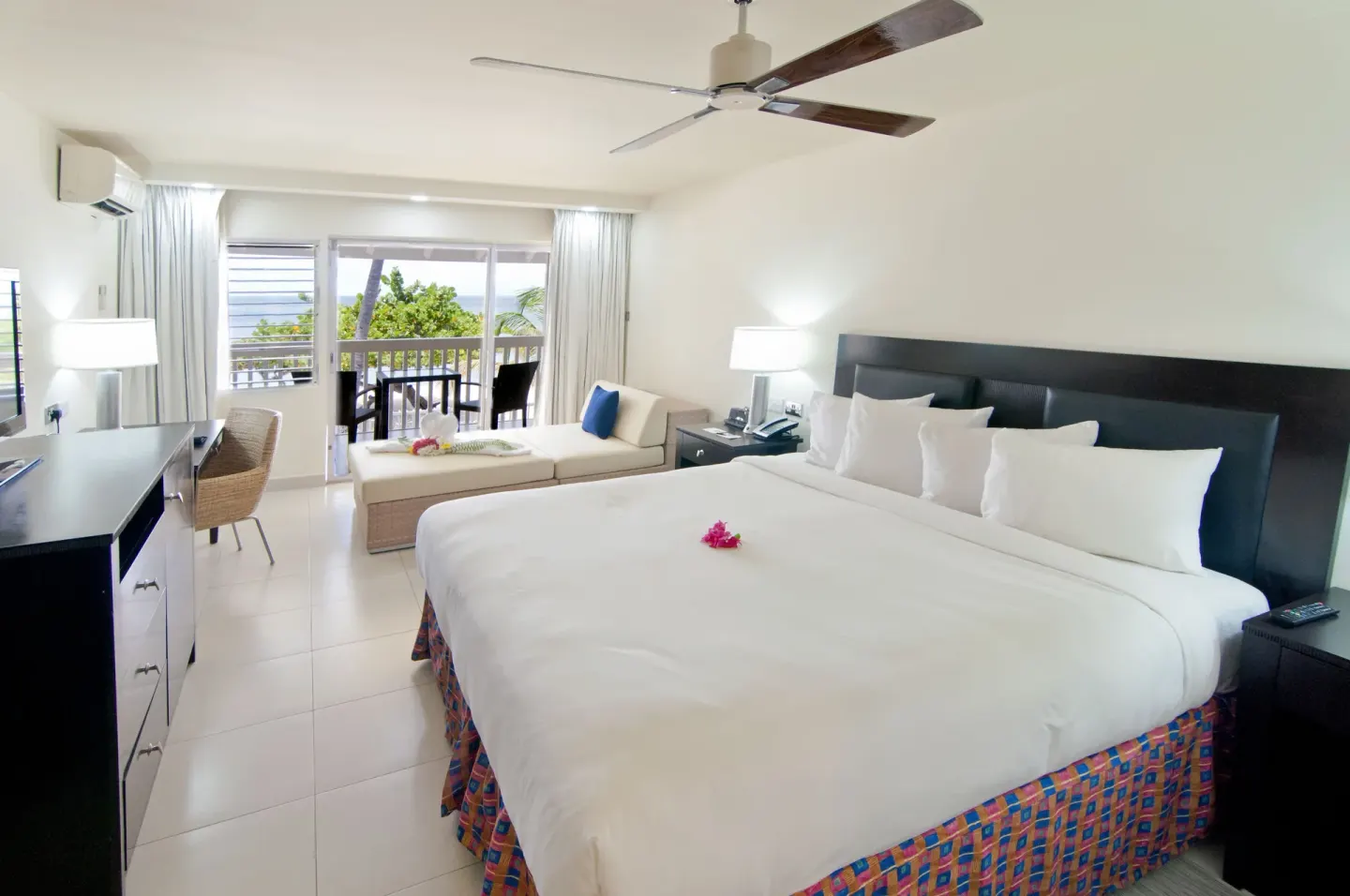 Non Smoking Garden View king room with balcony at Radisson Grenada Beach Resort.