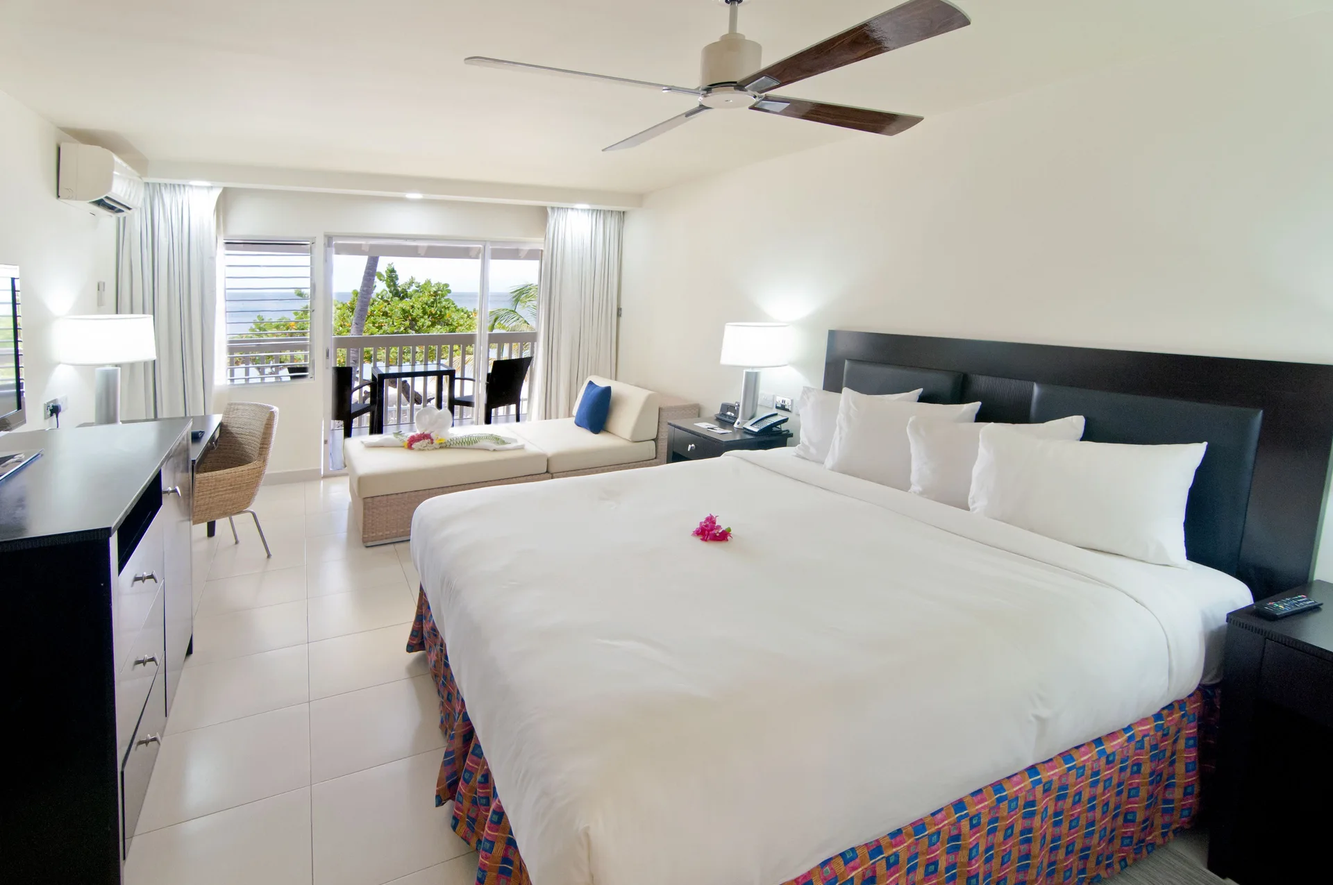 Non Smoking Garden View king room with balcony at Radisson Grenada Beach Resort.
