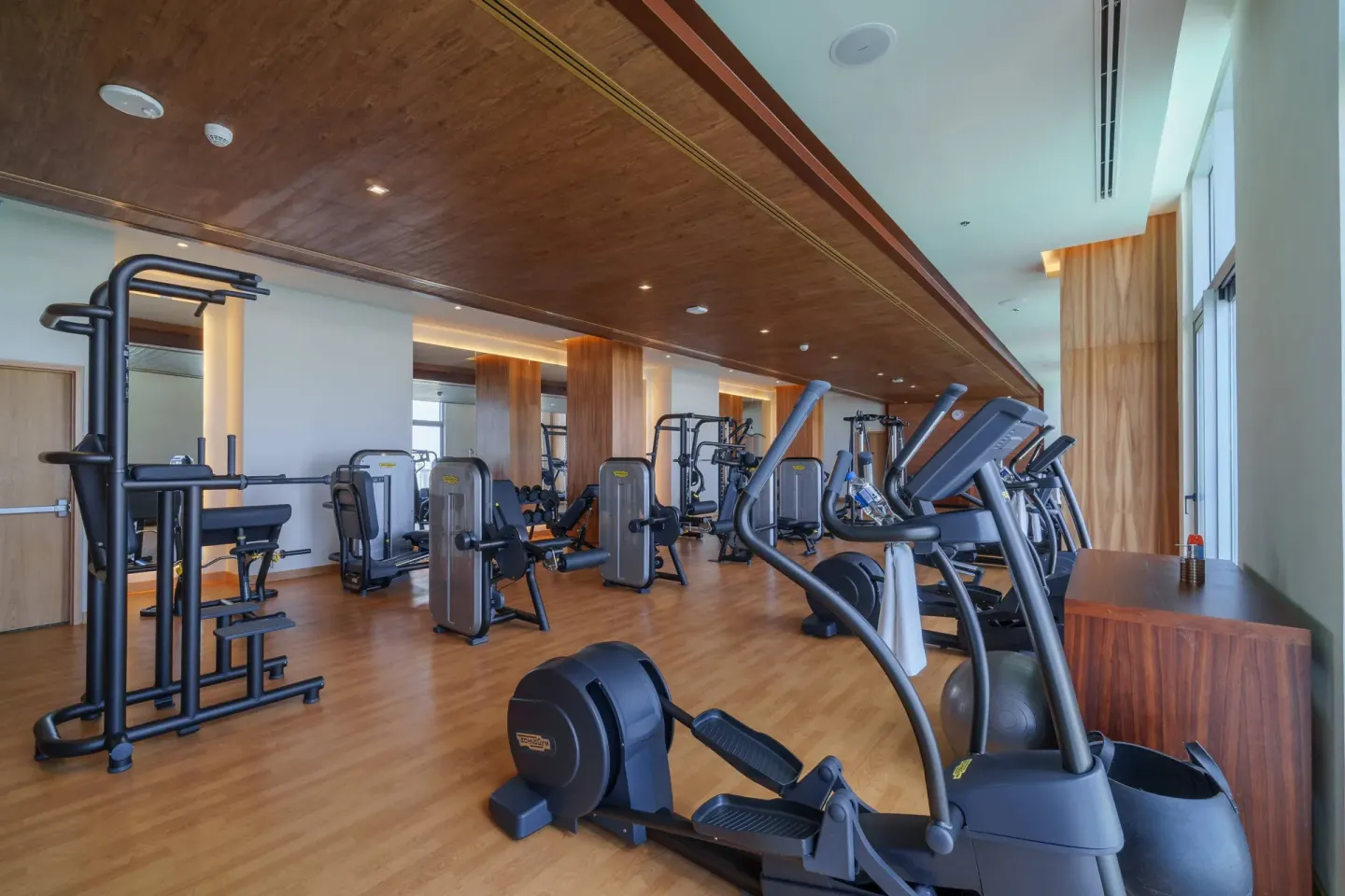 Fitness room with ellipticals and strength machines at Renaissance Cancun Resort & Marina.