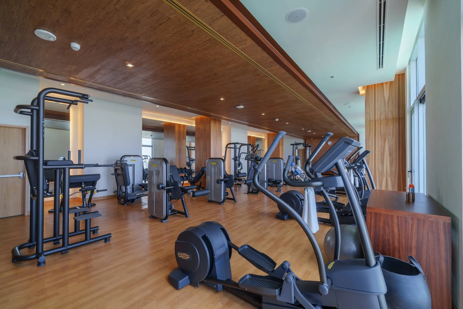 Fitness room with ellipticals and strength machines at Renaissance Cancun Resort & Marina.