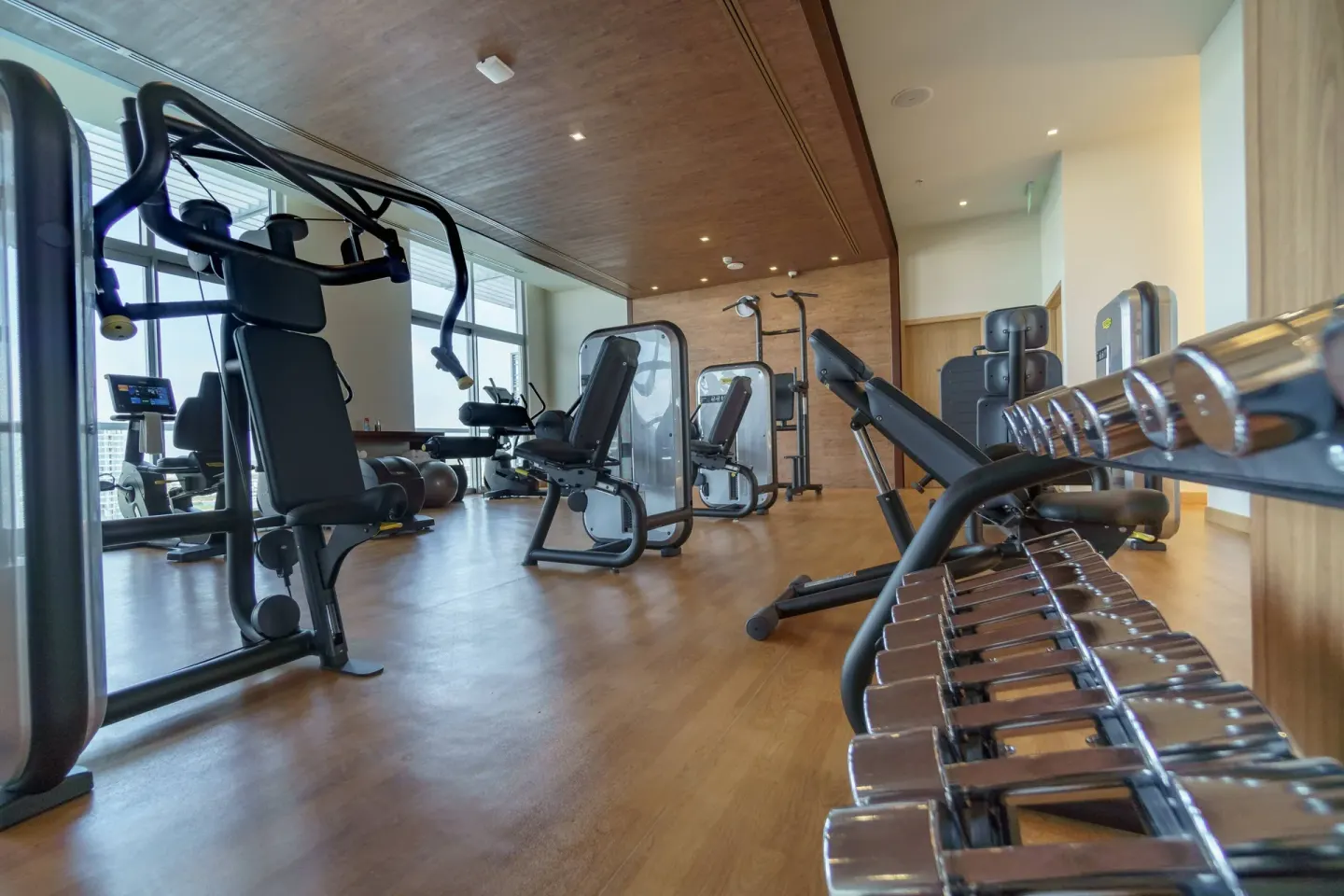 Free weights and strength equipment in the gym at Renaissance Cancun Resort & Marina.
