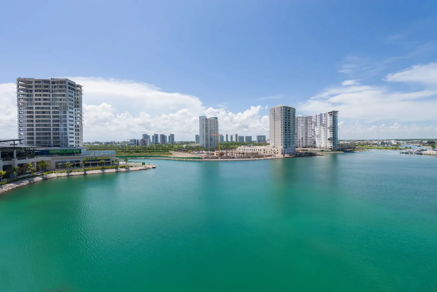 Turquoise lagoon and surrounding high-rises near Renaissance Cancun Resort & Marina.