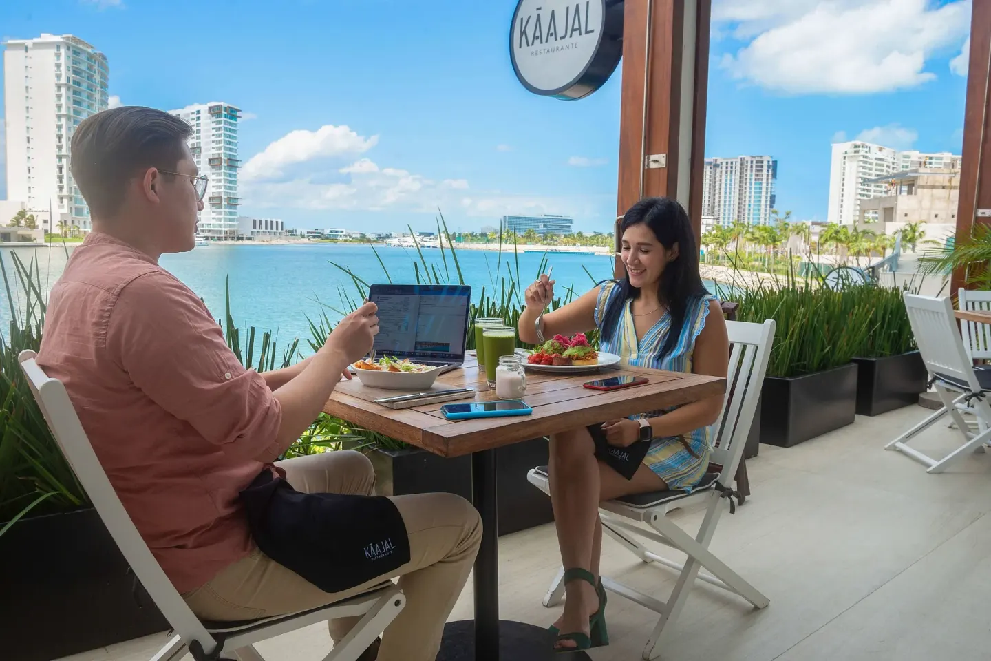 Guests dining on the Kaajal terrace at Renaissance Cancun Resort & Marina.