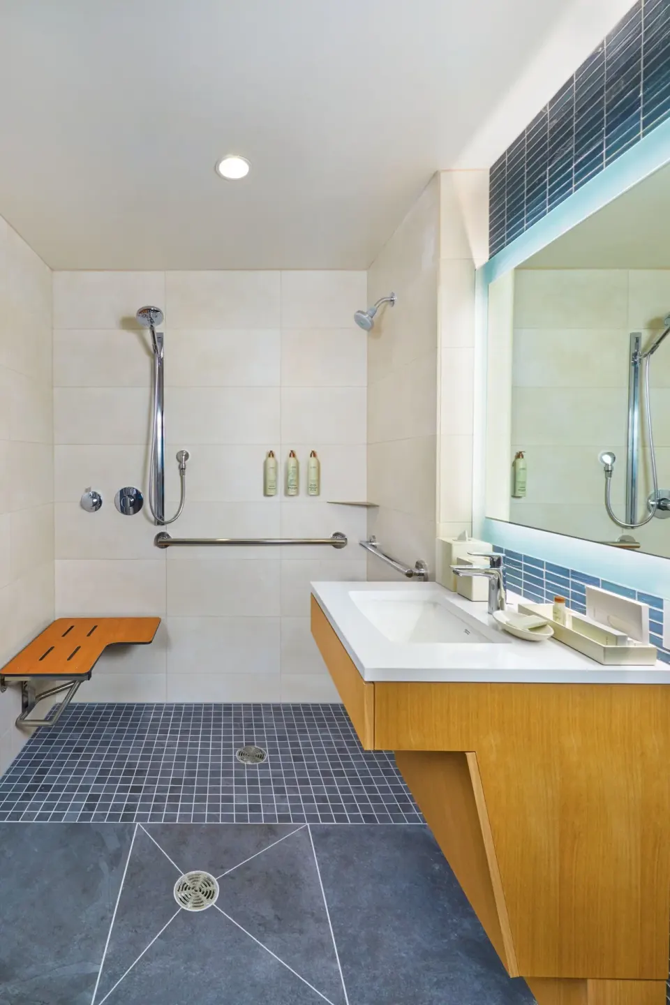 Accessible bathroom with roll-in shower and vanity at Renaissance Honolulu Hotel & Spa.