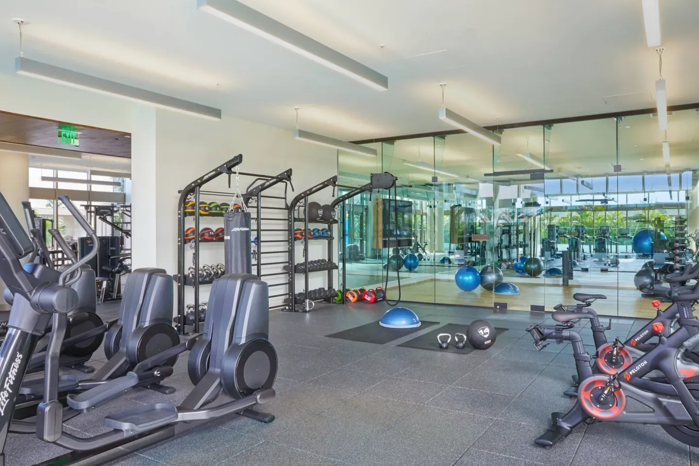 Fitness center with cardio machines and weights at Renaissance Honolulu Hotel & Spa.