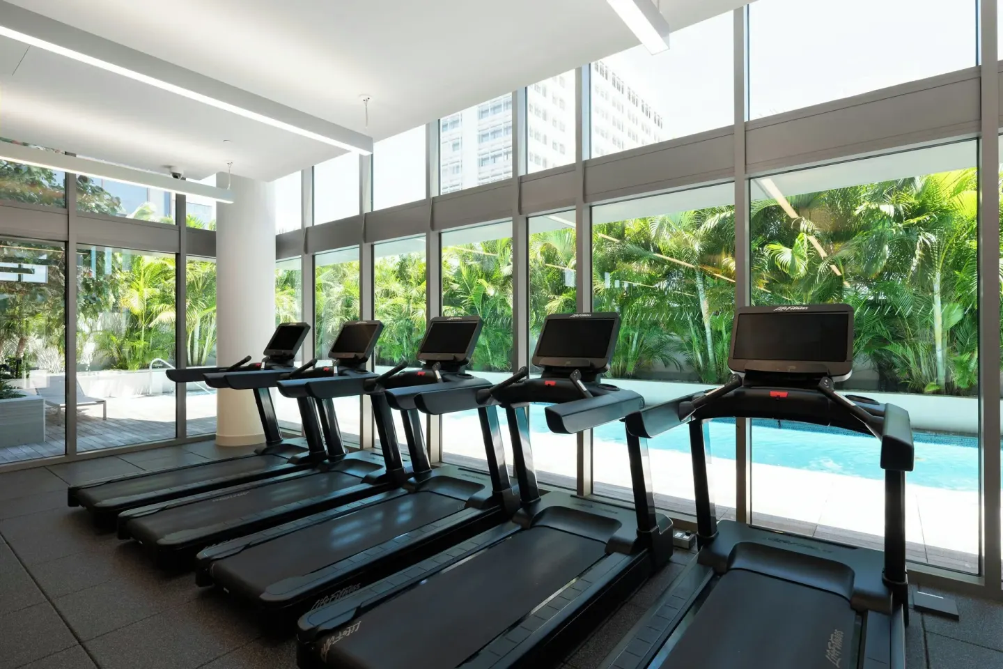 Treadmills facing garden windows at Renaissance Honolulu Hotel & Spa.