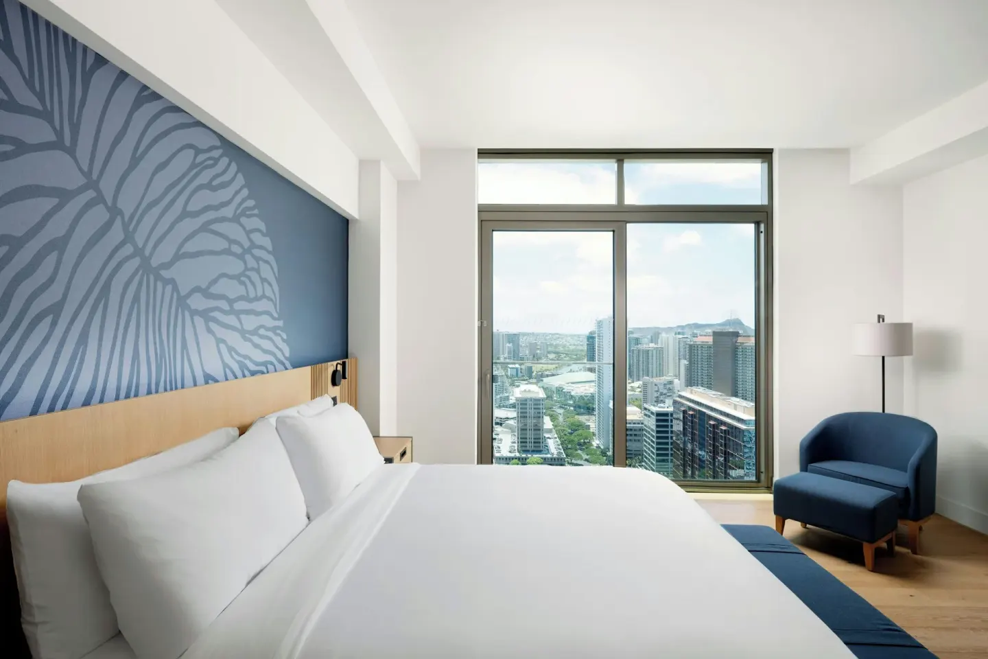 Bedroom city view in the Alani Penthouse suite at Renaissance Honolulu Hotel & Spa.