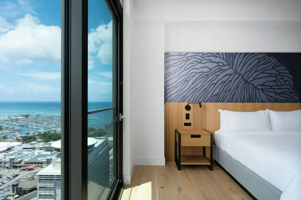 Bedroom ocean view in the Alani Penthouse suite at Renaissance Honolulu Hotel & Spa.