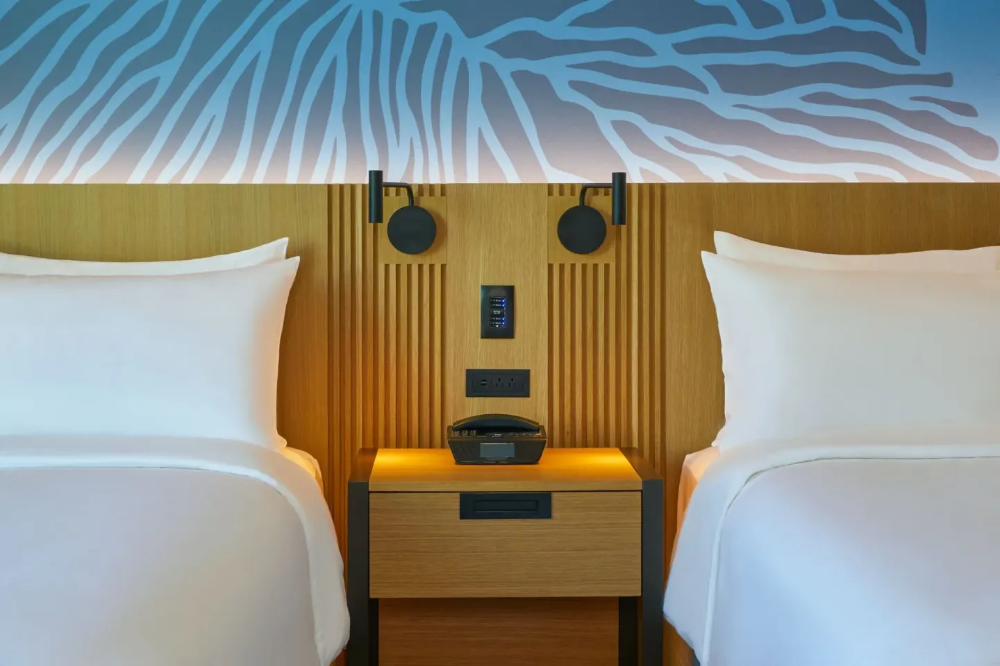 Close-up of two-bed City View room nightstand at Renaissance Honolulu Hotel & Spa.
