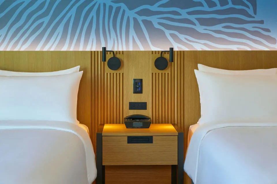 Close-up of two-bed City View room nightstand at Renaissance Honolulu Hotel & Spa.