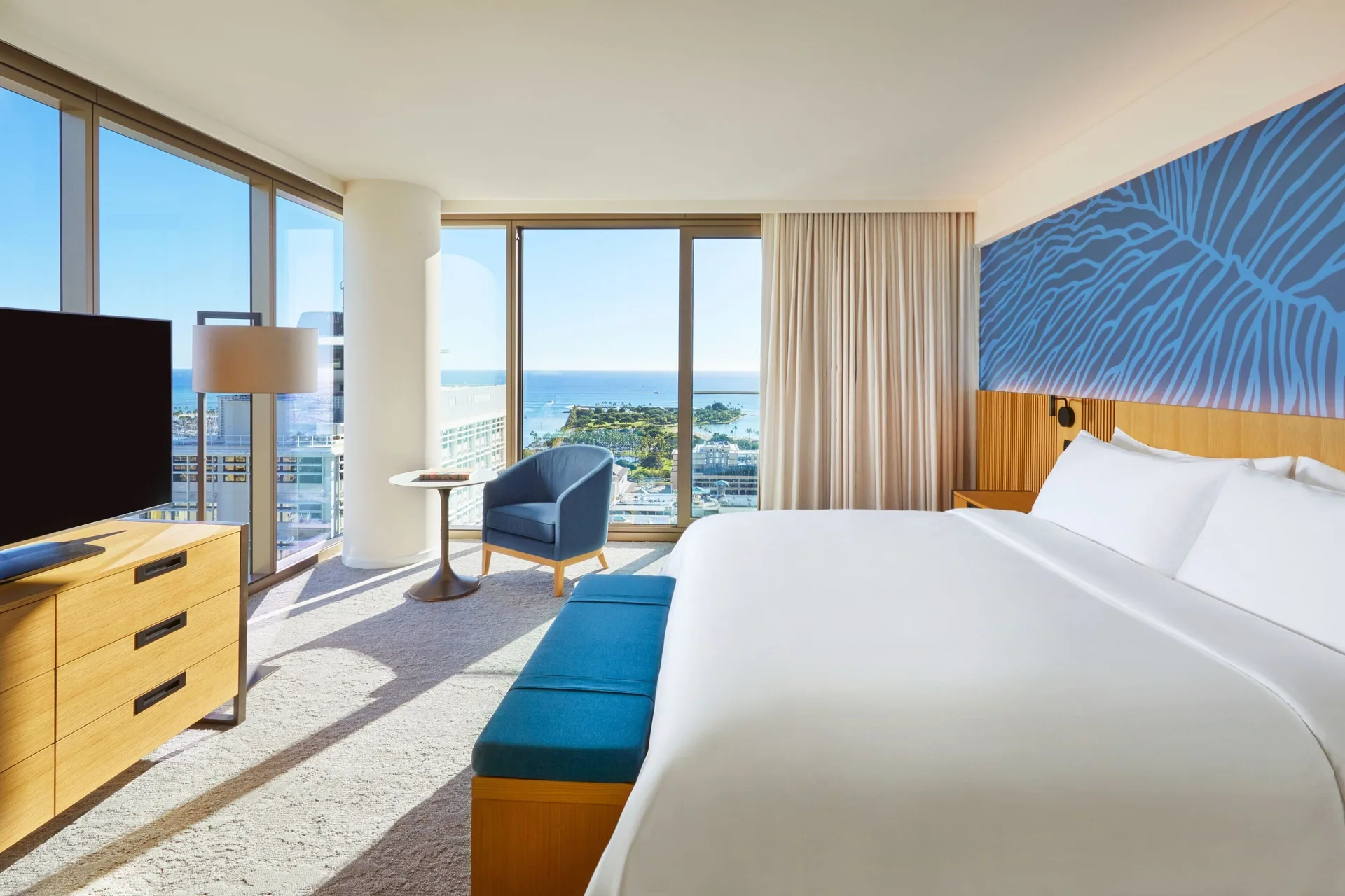 Ocean View Room One King at Renaissance Honolulu Hotel & Spa with king bed and Pacific Ocean views through floor-to-ceiling windows.