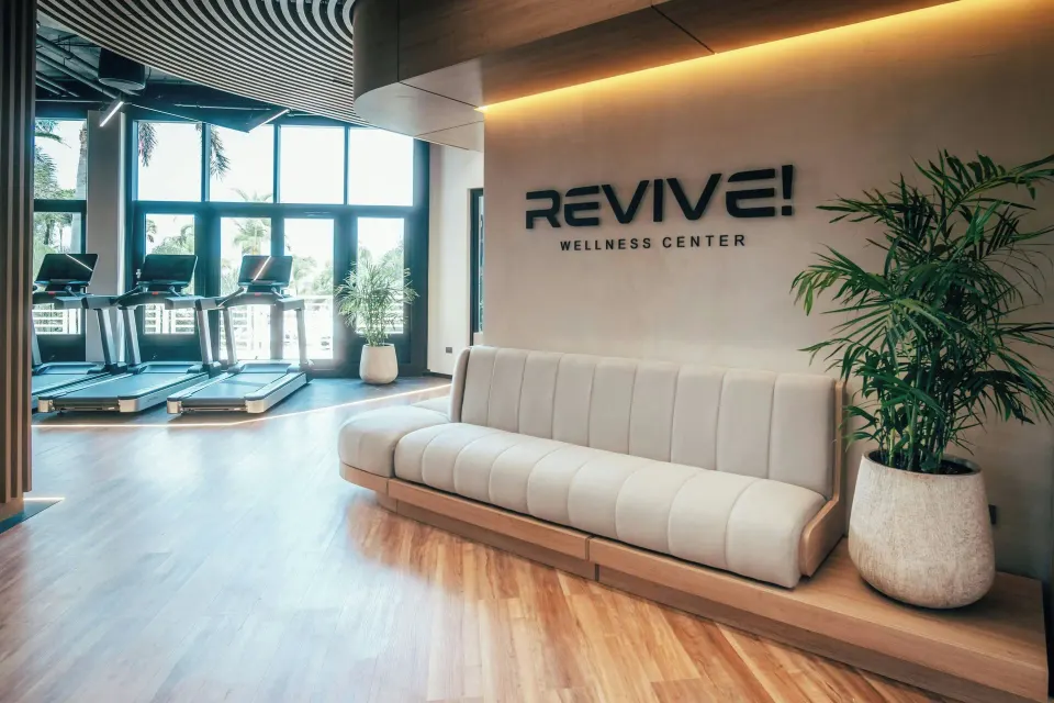 Wellness center lounge and treadmills at Renaissance Wind Creek Aruba Resort.