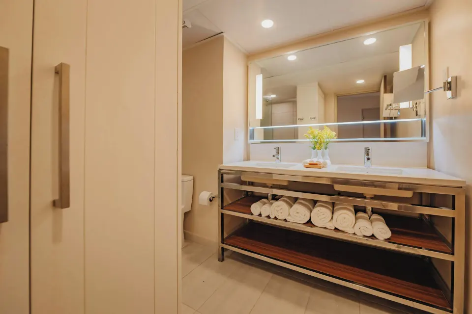 Suite bathroom vanity with double sinks at Renaissance Wind Creek Aruba Resort.