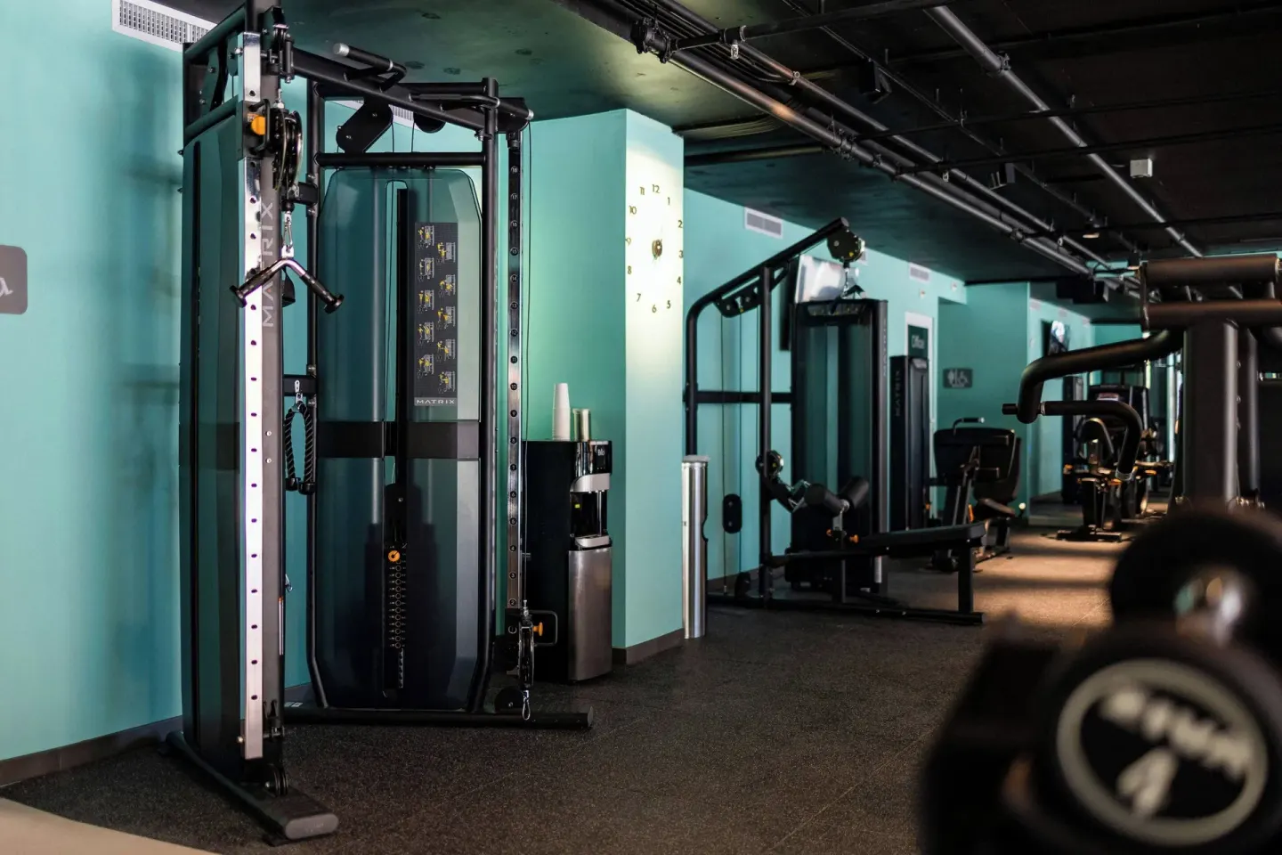 Strength-training machines line the fitness center at Renaissance Wind Creek Curacao Resort.