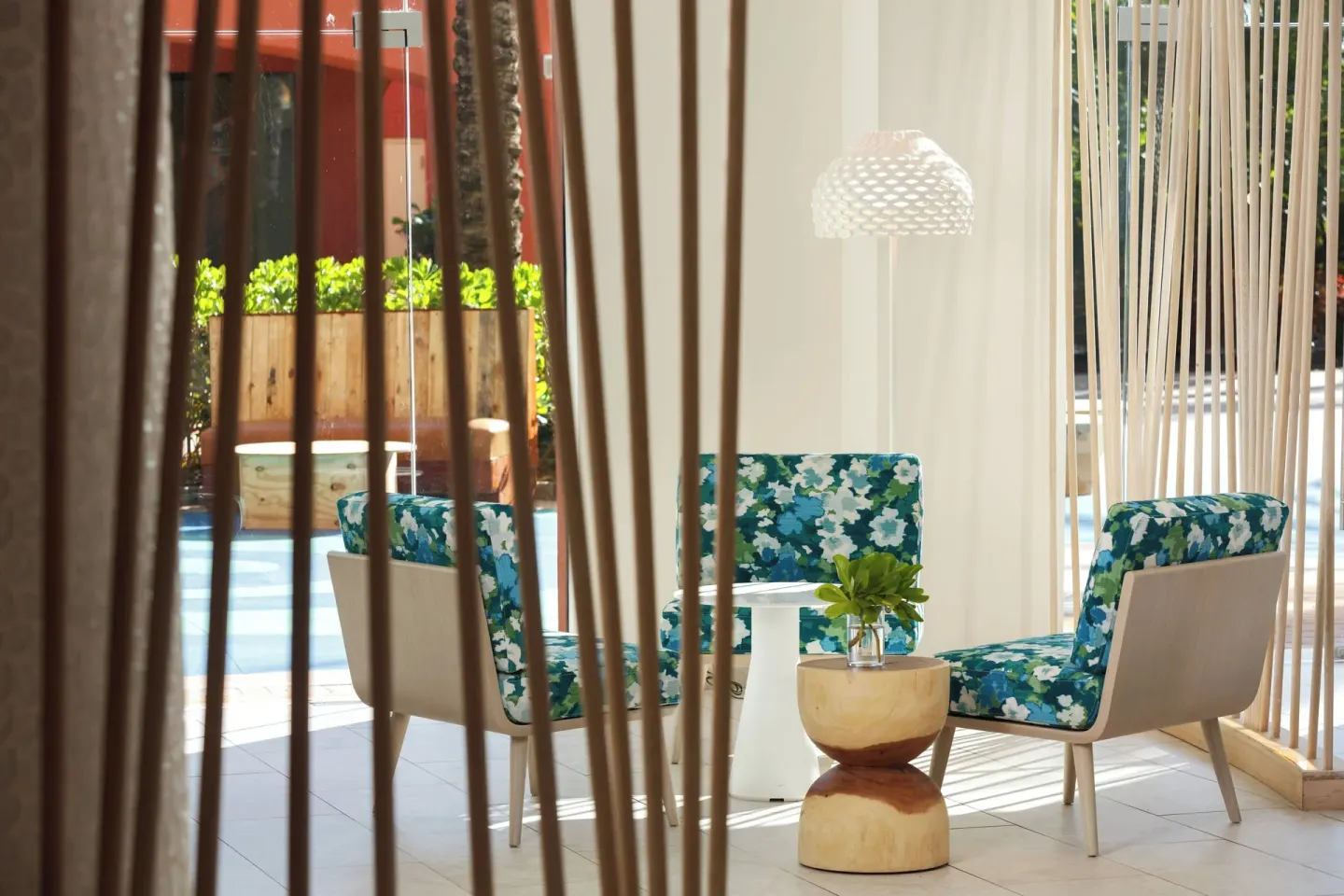 Patterned lounge chairs in a quiet seating nook at Renaissance Wind Creek Curacao Resort.