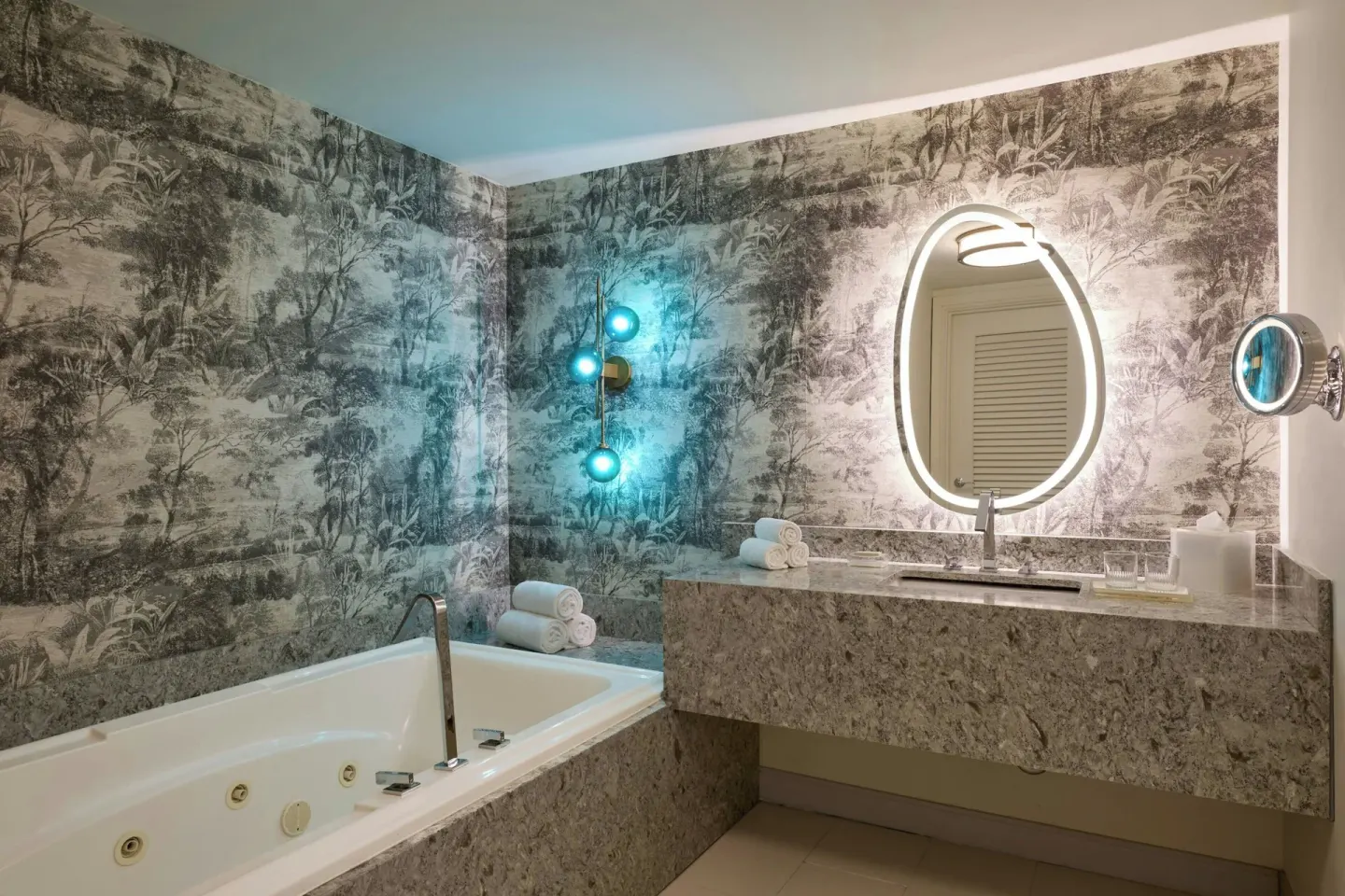 Executive suite bathroom with jetted tub and vanity at Renaissance Wind Creek Curacao Resort.