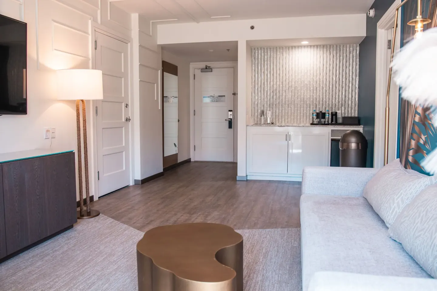 Executive suite living room with wet bar and entry area at Renaissance Wind Creek Curacao Resort.