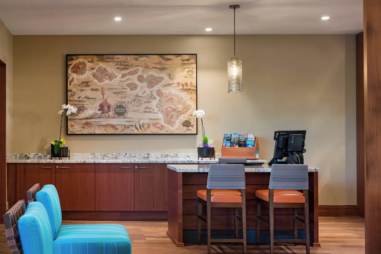 Business counter with computers and seating at Residence Inn Maui Wailea.
