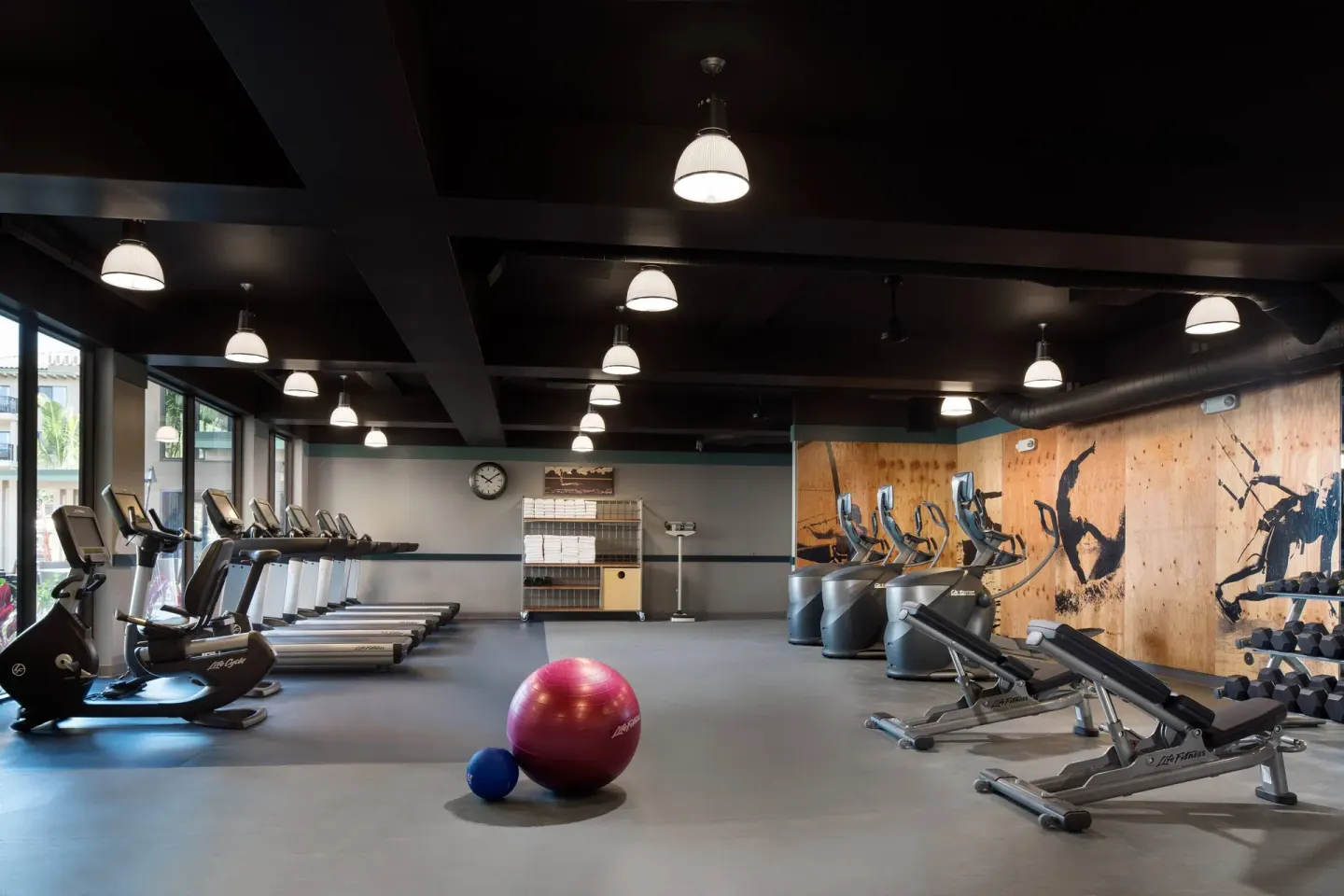 Fitness center with cardio machines and weights at Residence Inn Maui Wailea.