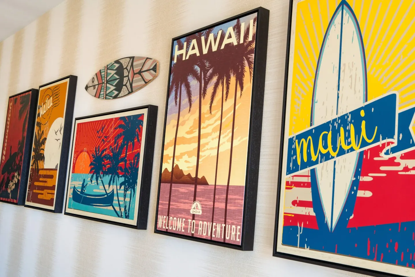 Framed Hawaii and Maui artwork on a wall at Residence Inn Maui Wailea.