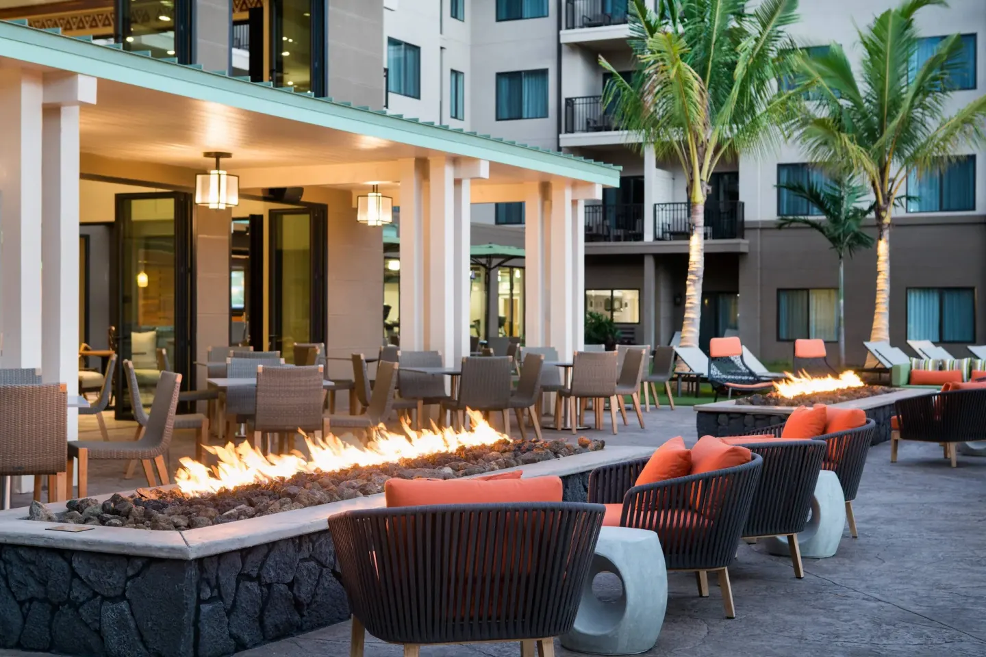 Outdoor lounge seating and fire pits at Residence Inn Maui Wailea.
