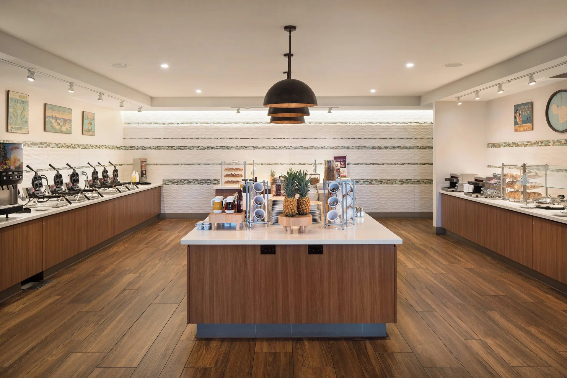Breakfast buffet with central island and serving counters at Residence Inn Maui Wailea.
