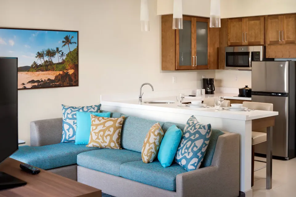 Studio kitchen and sofa seating area at Residence Inn Maui Wailea.