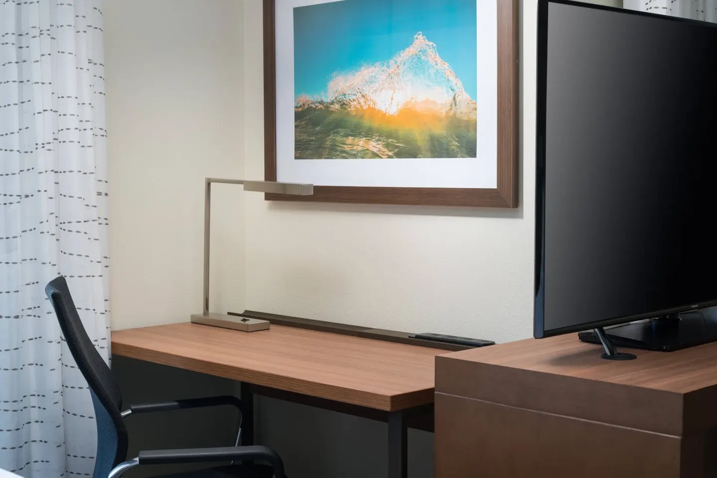 Studio work desk and TV detail at Residence Inn Maui Wailea.