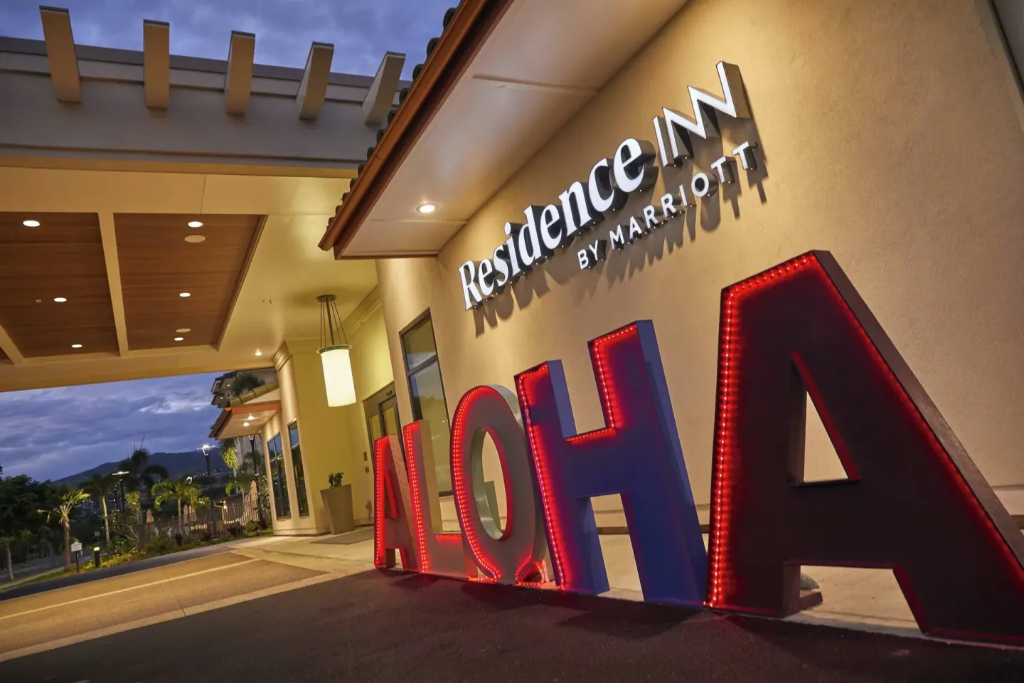 Close view of the illuminated aloha letters outside Residence Inn Oahu Kapolei.