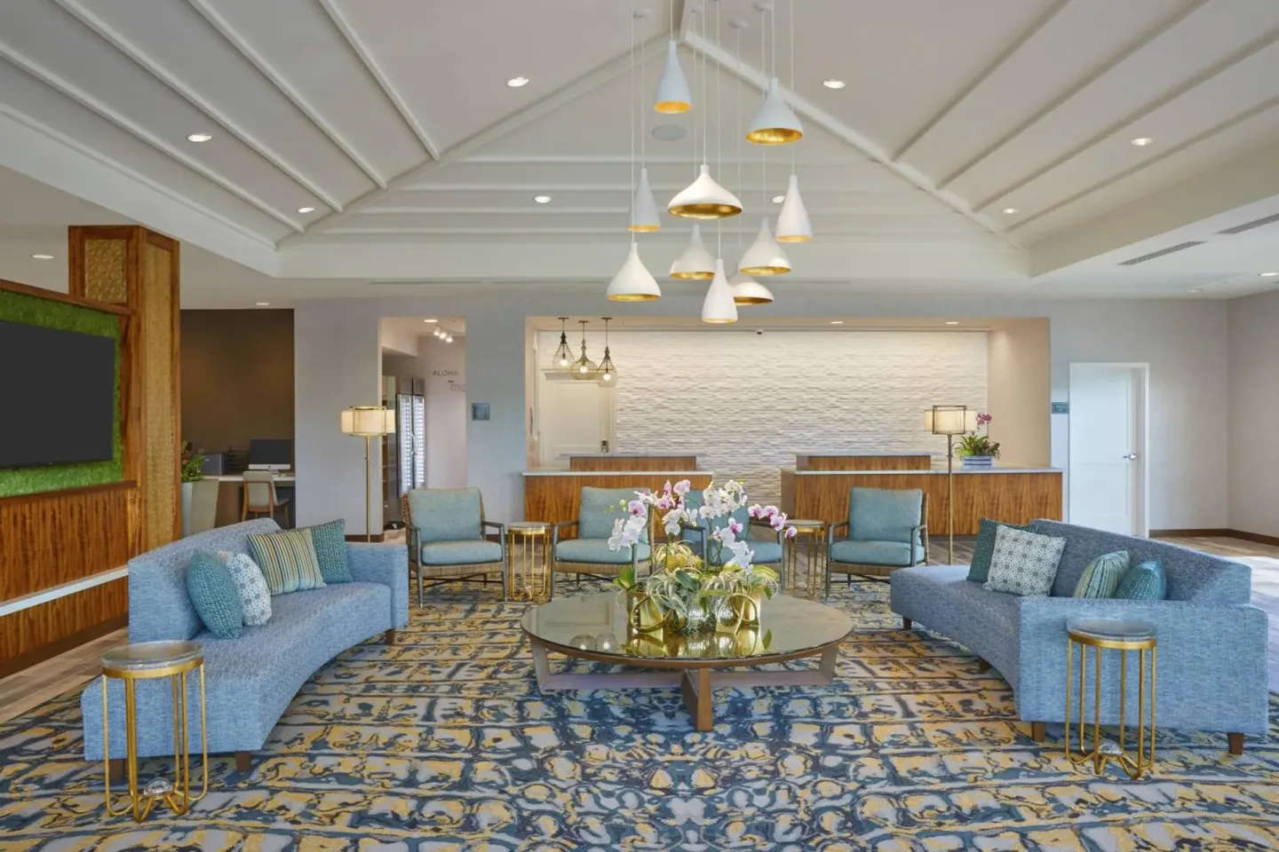 Lobby seating and reception desks at Residence Inn Oahu Kapolei.