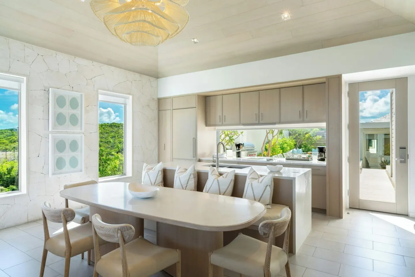 Ocean View Five Bedroom Reserve Villa dining table and kitchen at Rock House.