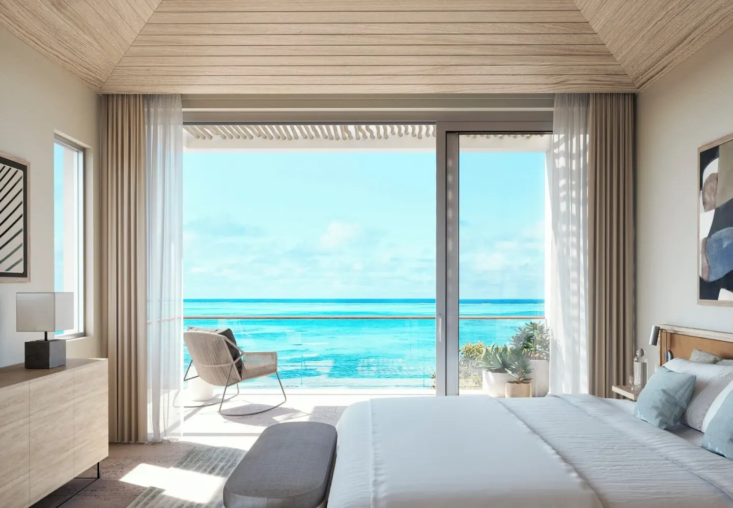 Ocean View Five Bedroom Reserve Villa bedroom with balcony and sea view at Rock House.