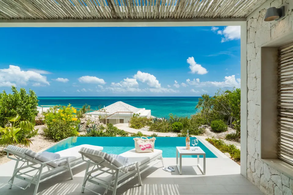 Ocean View Ridge One Bedroom at Rock House with plunge pool, loungers, and ocean view.