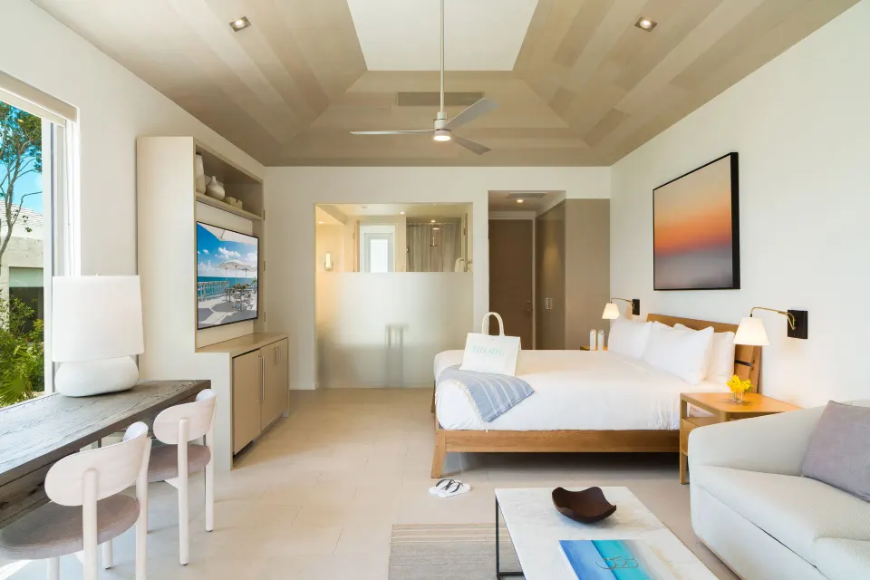 Ocean View Ridge Studio king bed, sofa, desk and bath area at Rock House.