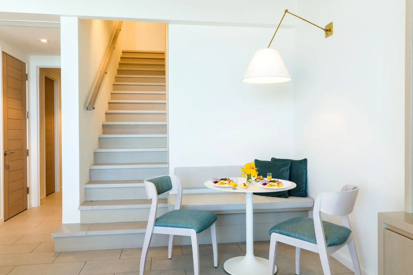 Oceanfront One Bedroom dining nook and stairway at Rock House.