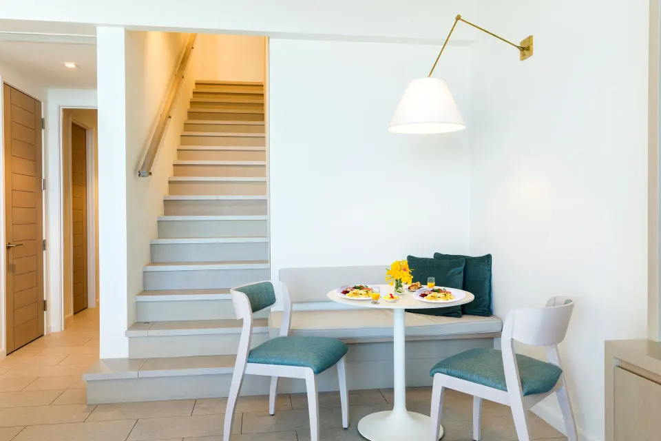Oceanfront One Bedroom dining nook and stairway at Rock House.