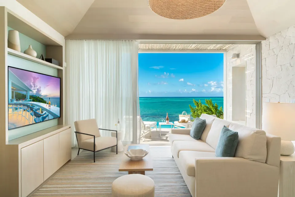 Oceanfront One Bedroom living room with ocean-facing terrace at Rock House.