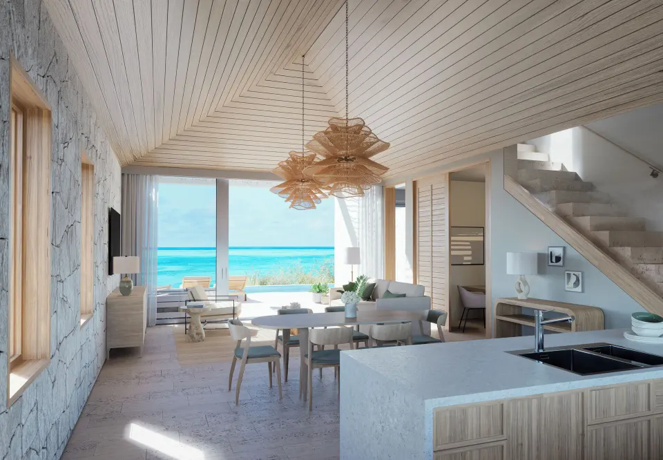 Ocean-view villa living, dining, kitchen, and terrace at Rock House.