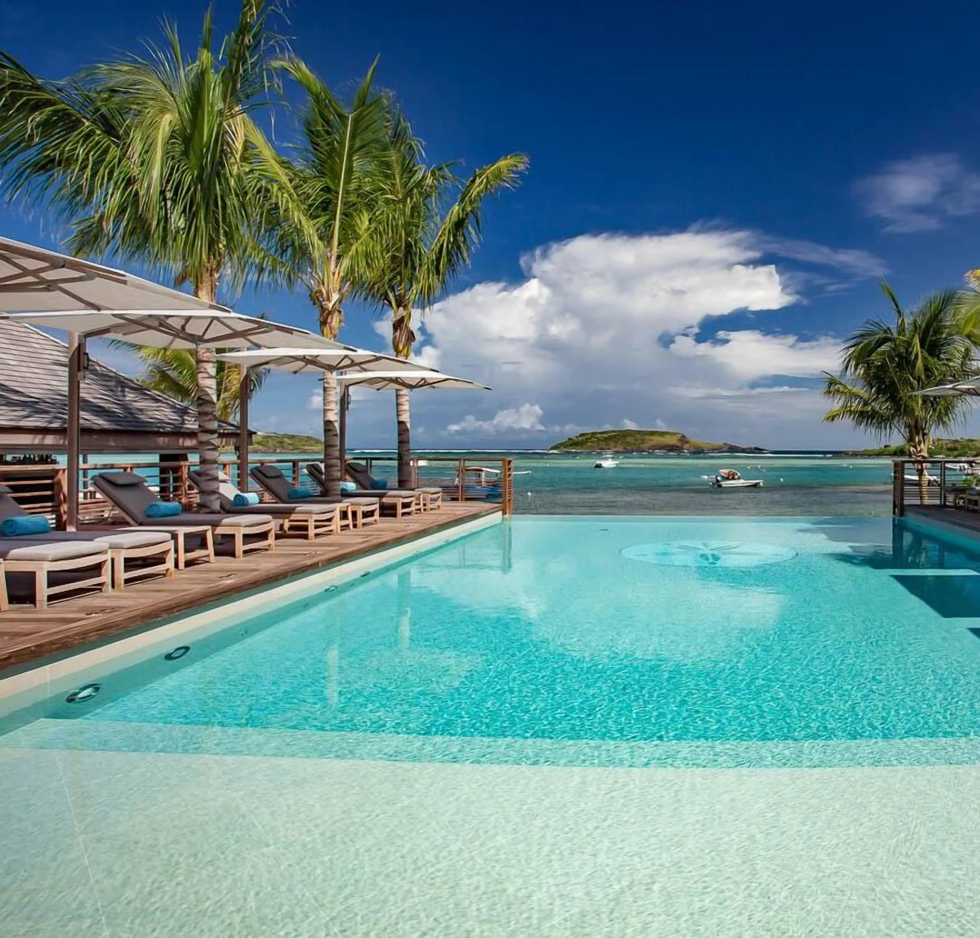 Le Barthélemy Hotel & Spa luxury beachfront resort on Grand Cul-de-Sac lagoon in St. Barthélemy with contemporary design and spa.