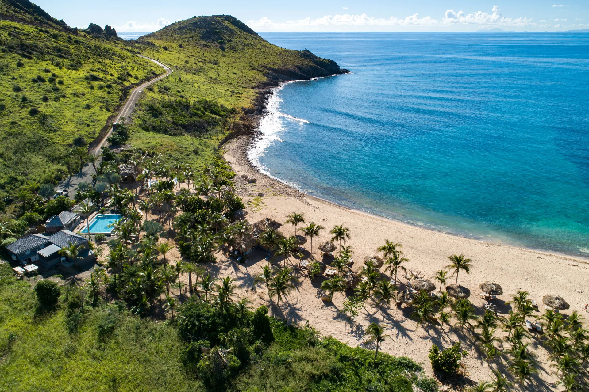 Le Toiny Hôtel & Beach Club secluded villa resort with private plunge pools on the hillside of St Barth overlooking Toiny Bay.