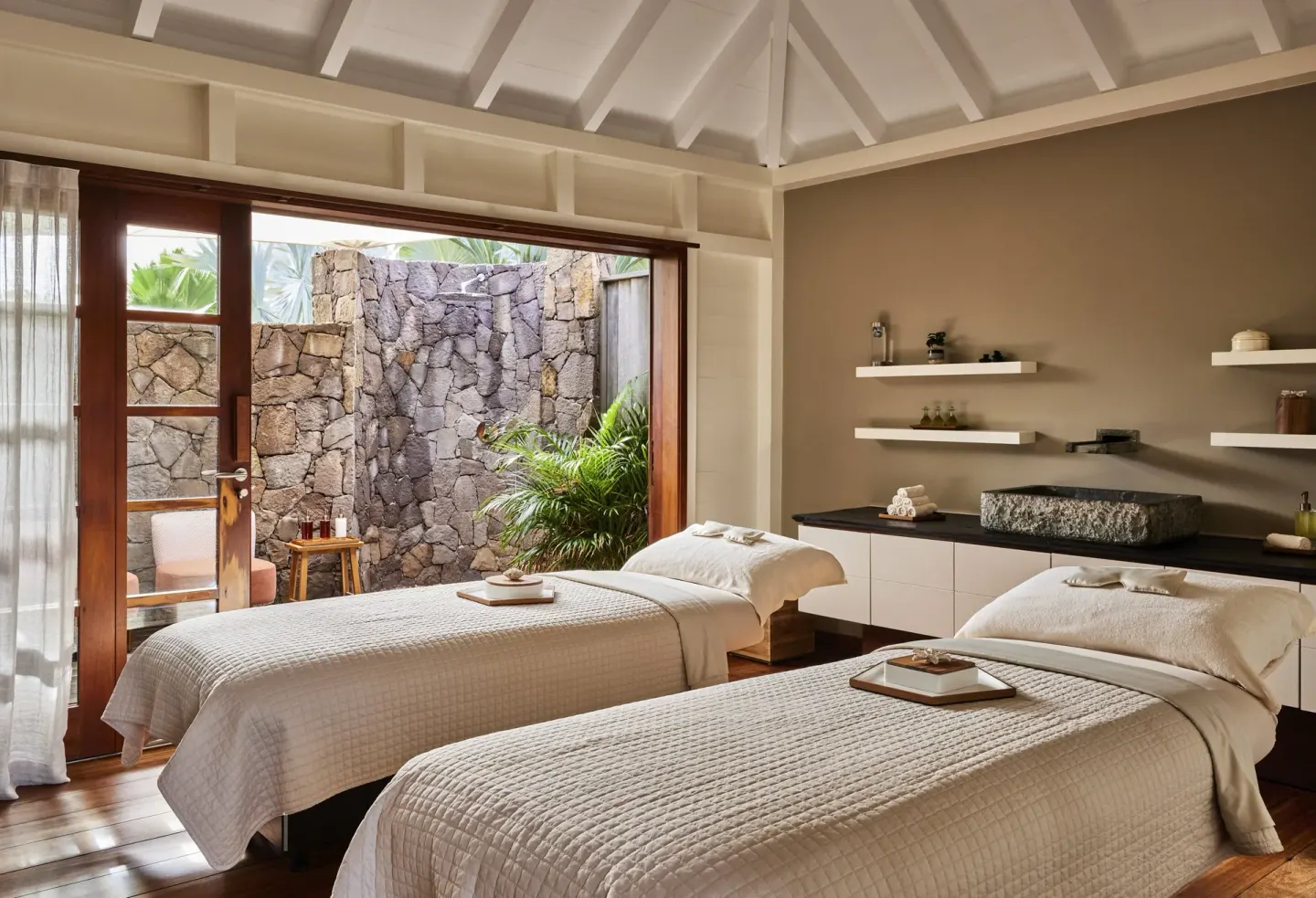 Spa treatment room with two massage beds at Rosewood Le Guanahani St Barth.