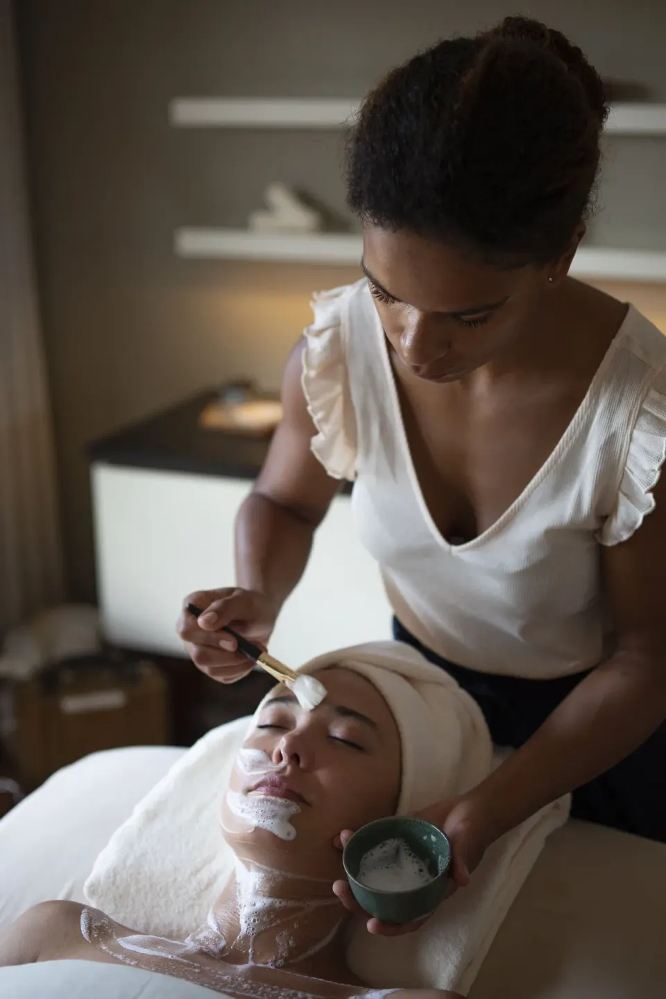 Facial treatment being applied in the spa at Rosewood Le Guanahani St Barth.