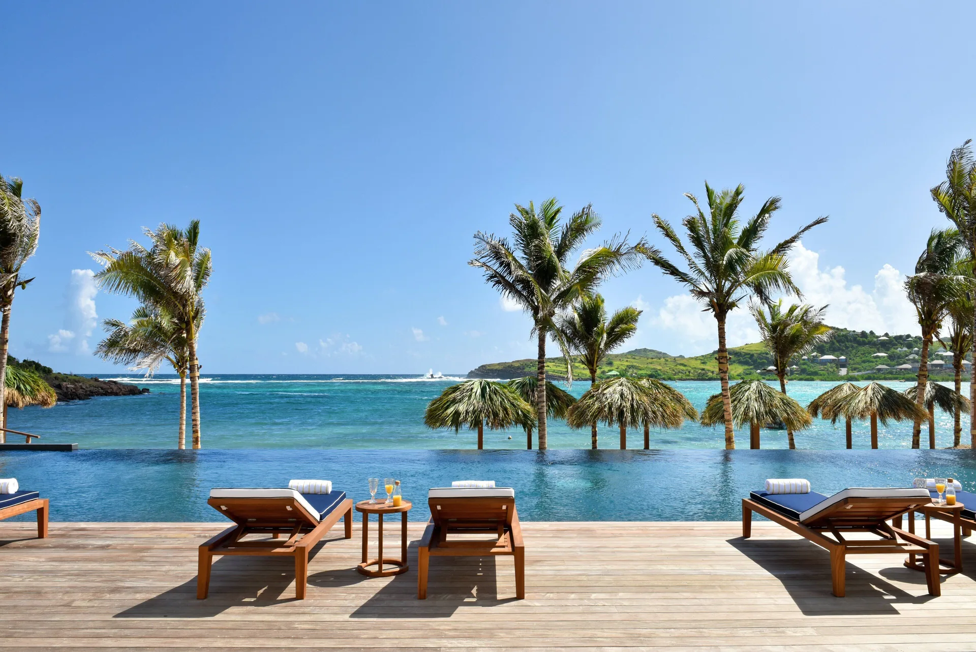 Rosewood Le Guanahani St Barth luxury resort with infinity pool overlooking the Caribbean Sea on a private peninsula in St Barthélemy.