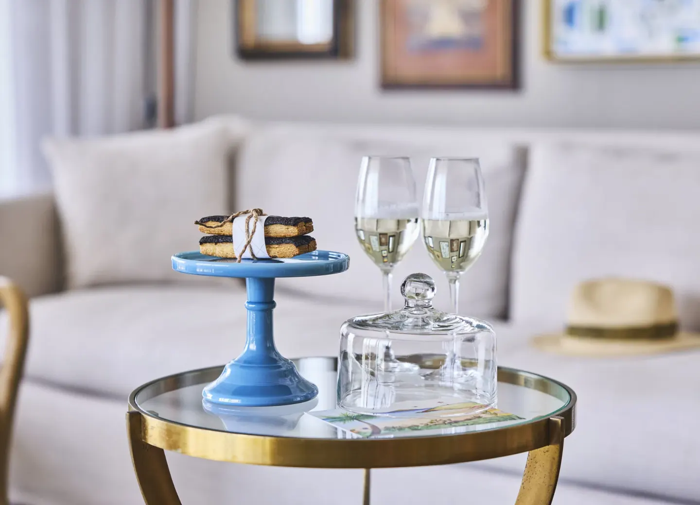 Welcome tray with wine glasses and cookies in a lounge at Rosewood Le Guanahani St Barth.