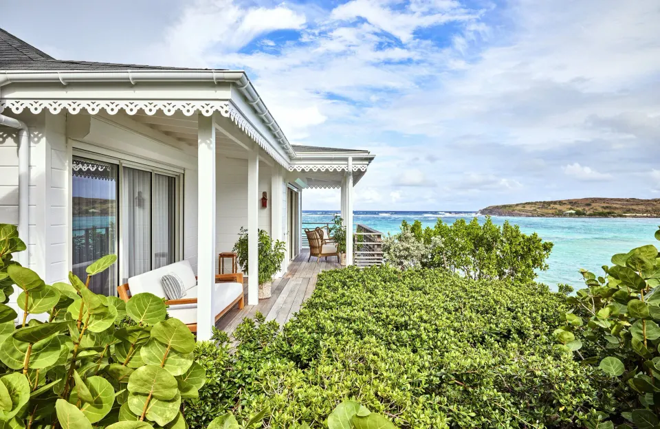 Admiral Suite exterior terrace by the water at Rosewood Le Guanahani St Barth.